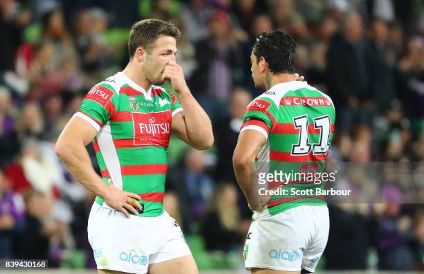 Sam Burgess and Rabbitohs players look dejected at the full time siren after the round 25 NRL match between the Melbourne Storm and the South Sydney...