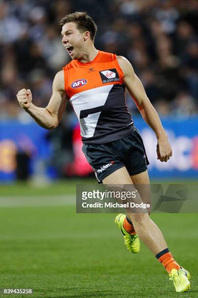 Toby Greene of the Giants celebrates a goal during the round 23 AFL match between the Geelong Cats and the Greater Western Sydney Giants at Simonds...