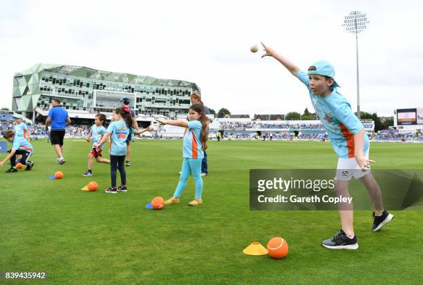 Children take part in All Stars cricket during day one of the 2nd Investec Test between England and the West Indies at Headingley on August 25, 2017...