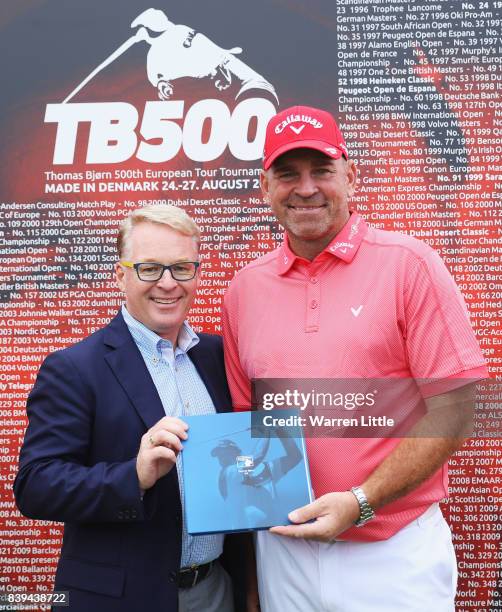 Keith Pelley, European Tour Chief Executive makes a presentation to Thomas Bjorn of Denmark after his 500th European Tour tournament during day three...