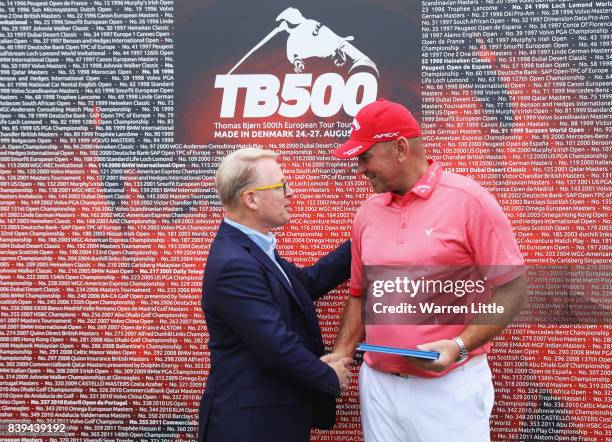 Keith Pelley, European Tour Chief Executive makes a presentation to Thomas Bjorn of Denmark after his 500th European Tour tournament during day three...
