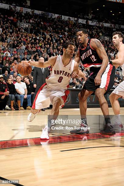 Jose Calderon of the Toronto Raptors drives baseline against the Portland Trail Blazers on December 7, 2008 at the Air Canada Centre in Toronto,...