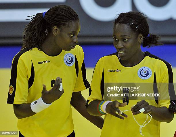 Best players of Portuguese handball team, the Sousa sisters, Juliana and Ana Miriam chat after their being defeated by Norway at the end of the 8th...