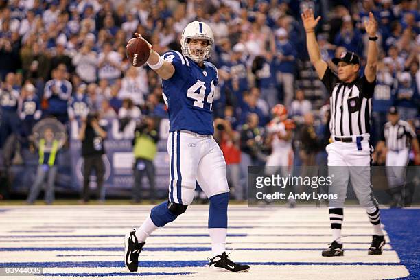 Dallas Clark of the Indianapolis Colts celebrates after he scored on a 4-yard touchdown reception in the third quarter against the Cincinnati Bengals...