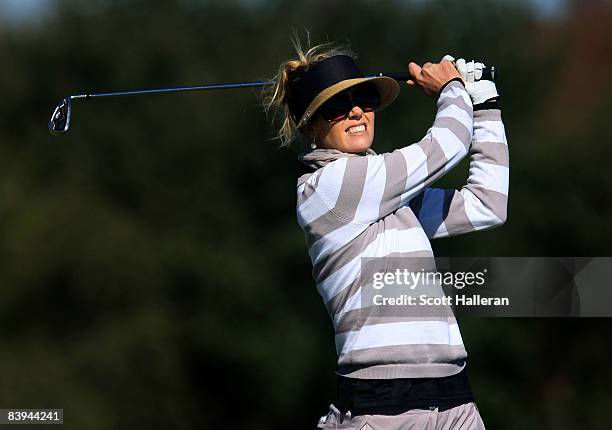 Anna Rawson of Australia watches her tee shot on the 14th hole during the final round of the LPGA Qualifying School at LPGA International on December...