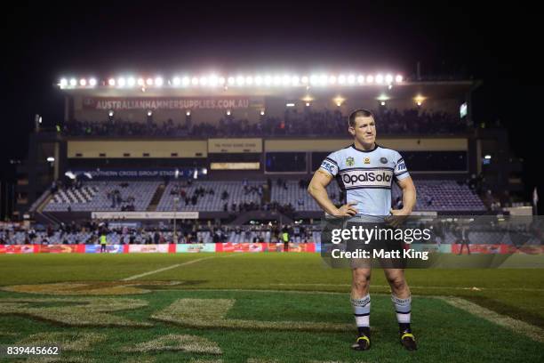 Paul Gallen of the Sharks looks dejected after fulltime during the round 25 NRL match between the Cronulla Sharks and the Sydney Roosters at Southern...