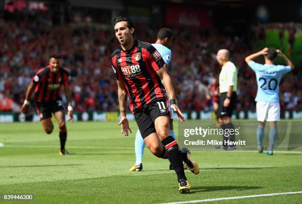 Charlie Daniels of AFC Bournemouth celebrates scoring his sides first goal during the Premier League match between AFC Bournemouth and Manchester...