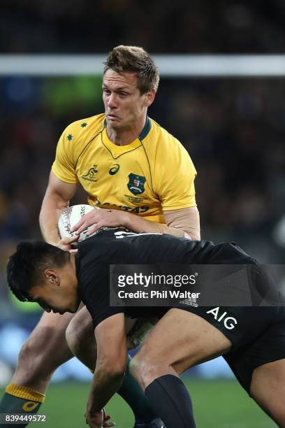 Dane Haylett-Petty of the All Blacks is tackeld by Reiko Ioane during The Rugby Championship Bledisloe Cup match between the New Zealand All Blacks...