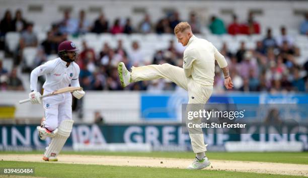 England bowler Ben Stokes reacts as Shai Hope picks up some runs during day two of the 2nd Investec Test match between England and West Indies at...