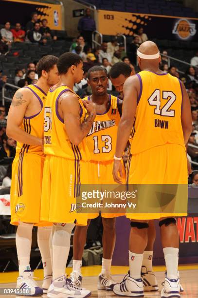 The Los Angeles D-Fenders huddle together during a break in the action of their game against the Tulsa 66ers at Staples Center on December 7, 2008 in...