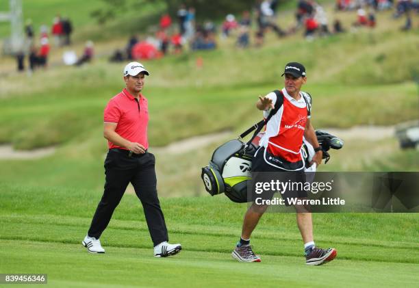 Steve Webster of England walks on the 7th hole with his caddie during day three of the Made in Denmark at Himmerland Golf & Spa Resort on August 26,...