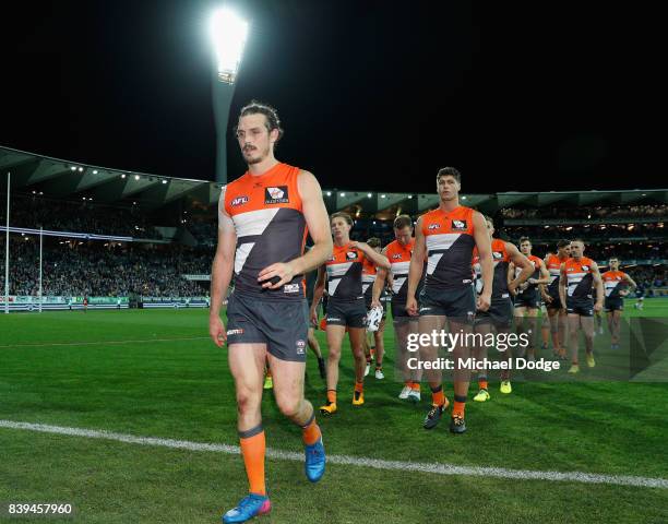 Jeremy Cameron of the Giants looks dejected after defeat during the round 23 AFL match between the Geelong Cats and the Greater Western Sydney Giants...