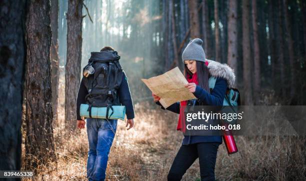 couple of backpackers hiking in the mountains - signaling pathways stock pictures, royalty-free photos & images