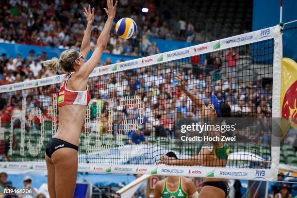 Sarah Pavan of Canada competes against Talita Da Rocha Antunes of Brazil during Day 4 of the Swatch Beach Volleyball FIVB World Tour Finals Hamburg...