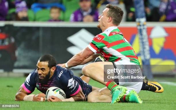 Josh Addo-Carr of the Storm scores a try during the round 25 NRL match between the Melbourne Storm and the South Sydney Rabbitohs at AAMI Park on...