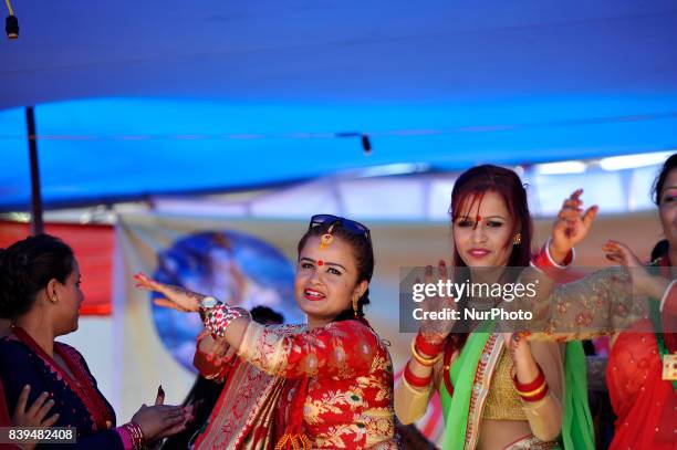 Nepalese hindu devotees dancing at the Rishishwor Mahadev Temple during Rishi Panchami Festival celebrations at Teku, Katmandu, Nepal on Saturday,...