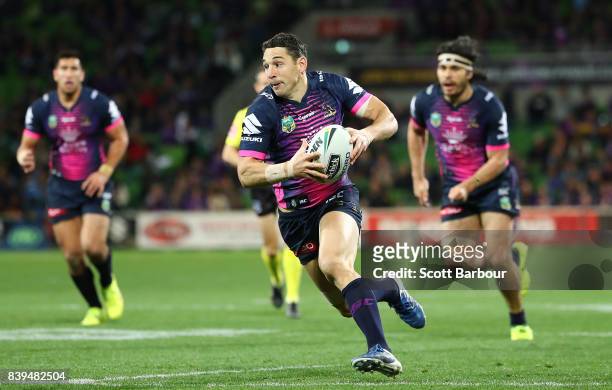 Billy Slater of the Storm runs with the ball during the round 25 NRL match between the Melbourne Storm and the South Sydney Rabbitohs at AAMI Park on...