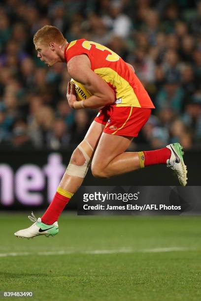 Peter Wright of the Suns marks during the 2017 AFL round 23 match between the Port Adelaide Power and the Gold Coast Suns at Adelaide Oval on August...