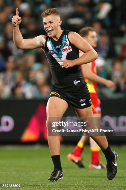 Dan Houston of the Power celebrates a goal during the 2017 AFL round 23 match between the Port Adelaide Power and the Gold Coast Suns at Adelaide...