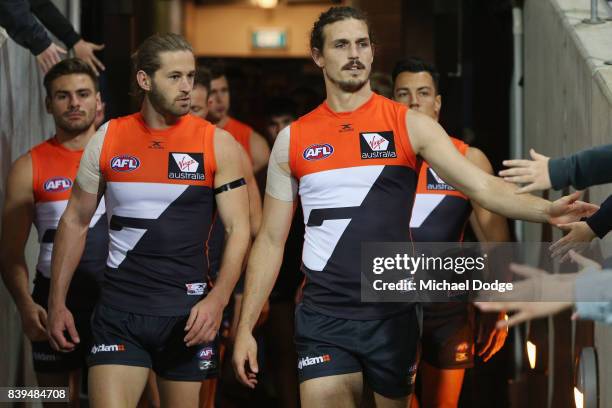 Callan Ward and Jeremy Cameron of the Giants during the round 23 AFL match between the Geelong Cats and the Greater Western Sydney Giants at Simonds...