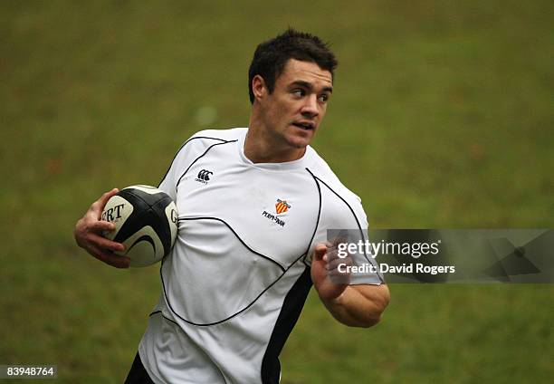 Dan Carter, the New Zealand standoff, takes part in his first training session with his new club, Perpignan, at Stade Aime Giral on December 8, 2008...