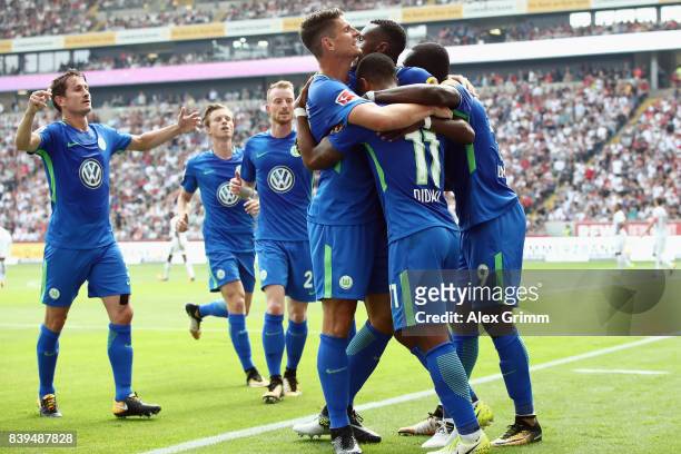 Daniel Didavi of Wolfsburg celebrates his team's first goal with team mates during the Bundesliga match between Eintracht Frankfurt and VfL Wolfsburg...