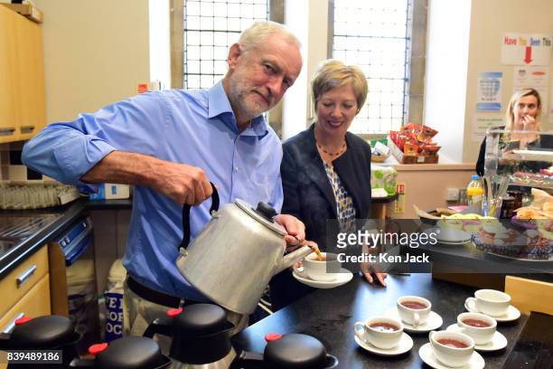 Labour Leader Jeremy Corbyn watched by Lesley Laird MP, pours tea for pensioners at a community centre in St Bryce Church, where former Prime...