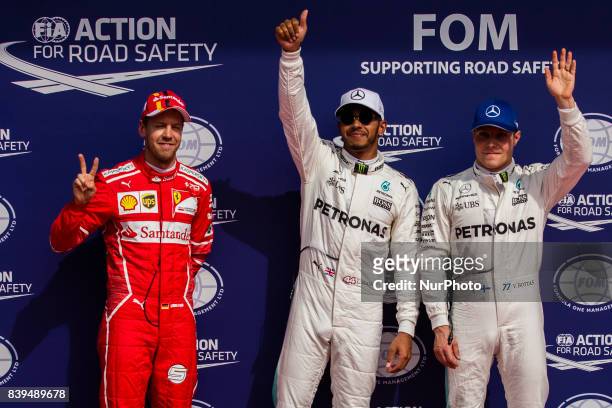Lewis from Great Britain of team Mercedes GP, 05 VETTEL Sebastian from Germany of scuderia Ferrari and 77 BOTTAS Valtteri from Finland of team...