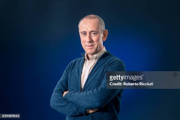 English theatre director, film director and film producer Nicholas Hytner attends a photocall during the annual Edinburgh International Book Festival...