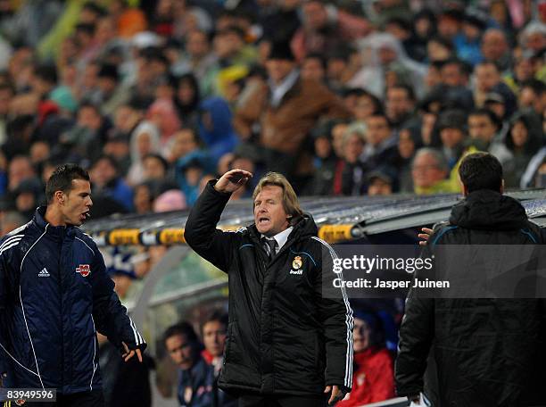 Coach Bernd Schuster of Real Madrid reacts during the La Liga match between Real Madrid and Sevilla at the Santiago Bernabeu Stadium on December 7,...