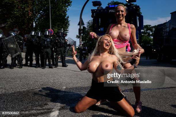 Two nude woman during riots on July 7, 2017 in Hamburg, Germany. German police and protesters clashed for three day during the G20 summit where...