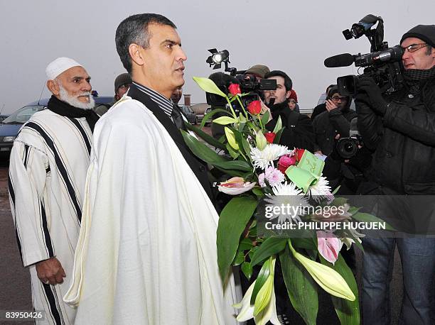 French representatives of the Islamic community arrive to lay down flowers on graves on December 8, 2008 at Notre-Dame-de-Lorette cemetery in...