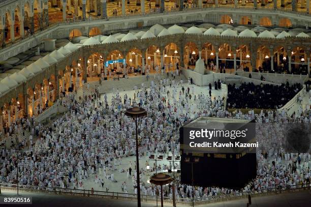 Muslim pilgrims circumambulate the Kaaba at the Masjid al-Haram before sunset prayers in the holy city of Mecca, Saudi Arabia, 28th November 2005....