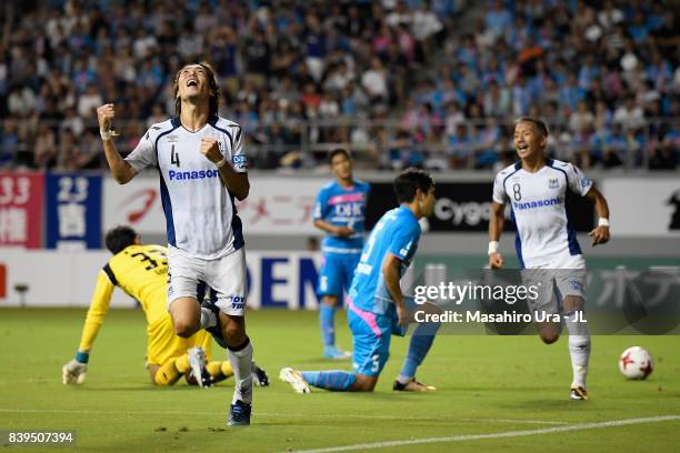 Hiroki Fujiharu of Gamba Osaka celebrates scoring his side's third goal during the J.League J1 match between Sagan Tosu and Gamba Osaka at Best...