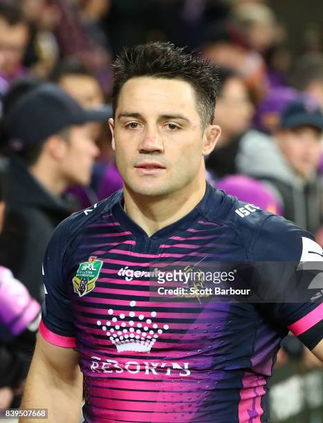 Cooper Cronk of the Storm thanks supporters in the crowd after winning the round 25 NRL match between the Melbourne Storm and the South Sydney...