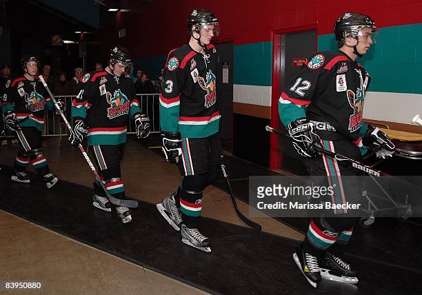Dylan Hood, Lukas Matejka, Tyler Myers and Cody Almond of the Kelowna Rockets head to the ice against the Saskatoon Blades on December 3, 2008 at...