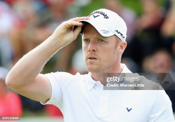 David Horsey of England acknowledges the crowd on the 18th green during the third round of the Made in Denmark at Himmerland Golf & Spa Resort on...