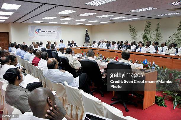 Caribbean leaders attend the opening session of the third CARICOM summit, a trade organization of 14 Caribbean nations, December 8, 2008 in Santiago...
