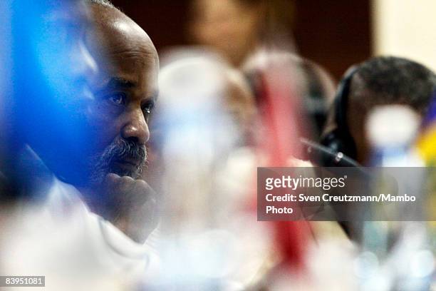 President Rene Preval of Haiti listens to the speech of President Raul Castro of Cuba during the opening session of the third CARICOM summit, a trade...