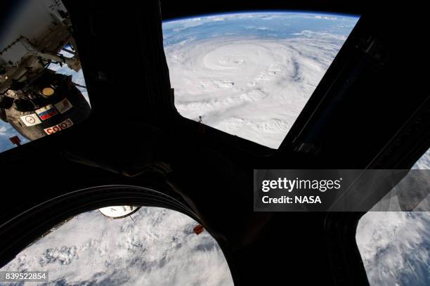 In this NASA handout image, Hurricane Harvey from the cupola module aboard the International Space Station as it intensified on its way toward the...