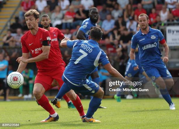 David Mooney of Leyton Orient and Sam Wood of Eastleigh compete for the ball during the National League match between Leyton Orient and Eastleigh at...