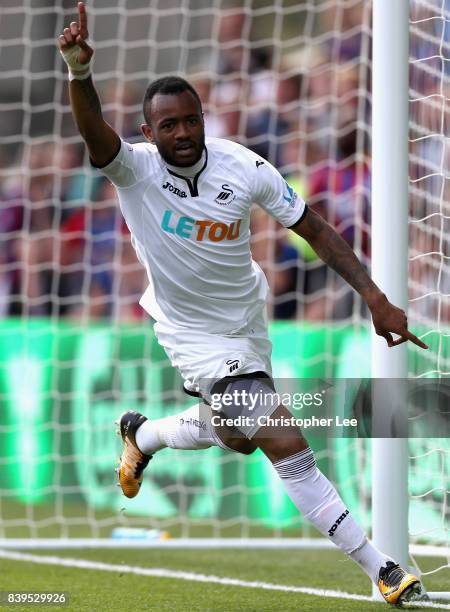 Jordan Ayew of Swansea City celebrates scoring his sides second goal during the Premier League match between Crystal Palace and Swansea City at...