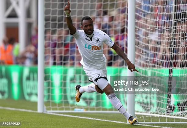 Jordan Ayew of Swansea City celebrates scoring his sides second goal during the Premier League match between Crystal Palace and Swansea City at...