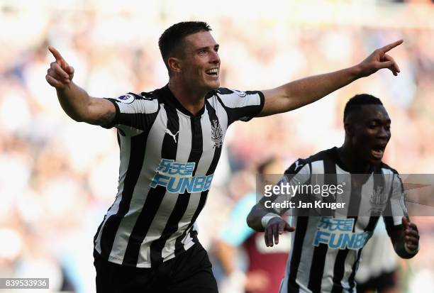 Ciaran Clark of Newcastle United celebrates scoring his sides second goal during the Premier League match between Newcastle United and West Ham...