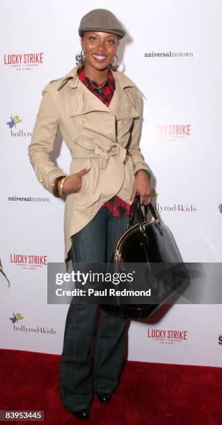 Actress/model Eva Pigford attends Children's Holiday Bowl and Toy Drive benefiting the Children of South L.A.'s youth center " A Place Called Home"...