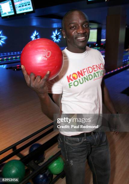 Recording artist Akon attends Children's Holiday Bowl and Toy Drive benefiting the Children of South L.A.'s youth center " A Place Called Home"...