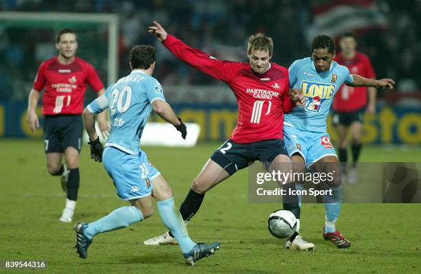 Mathieu BODMER entre BONNART et THOMAS - Lille / Le Mans - - 29eme journee de Ligue 1 -