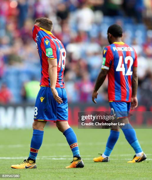 James McArthur of Crystal Palace and Jason Puncheon of Crystal Palace walk off dejected after the Premier League match between Crystal Palace and...