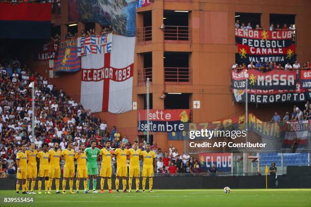 Juventus' players stand in a moment of tribute to the victims of the Ischia earthquake ahead of the Italian Serie A football match Genoa v Juventus...