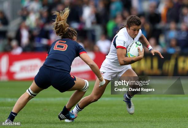 Nicole Heavirland of The USA runs at Marjorie Mayans France during the Women's Rugby World Cup 2017 Third Place Match between France and The USA on...